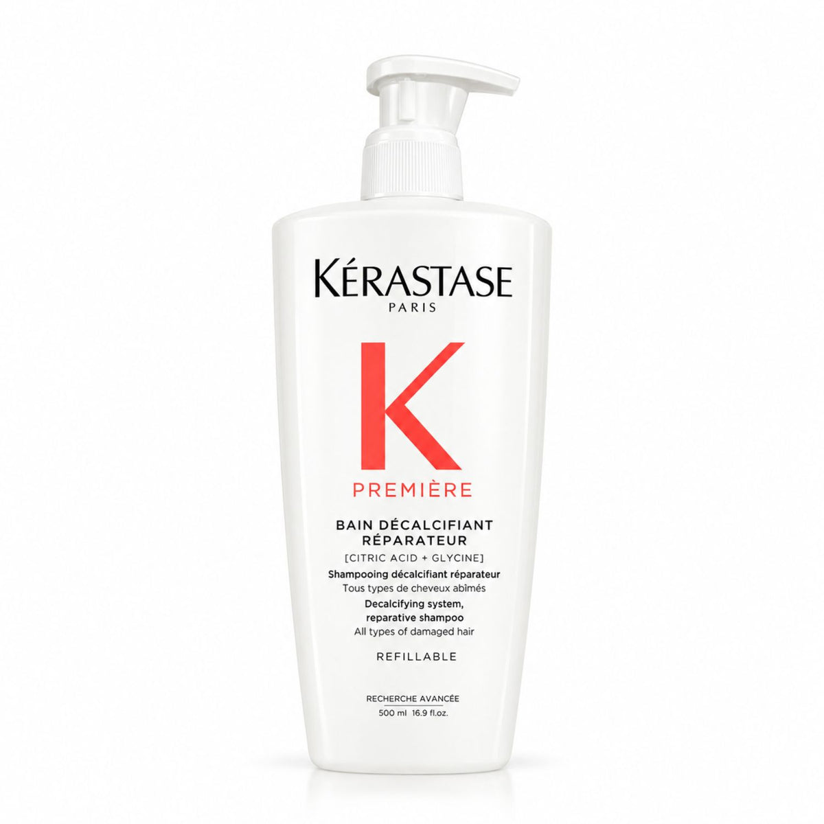 Kérastase Première Bain Décalcifiant Réparateur 500 ml, shampoo reparador para cabello dañado con dosificador blanco.