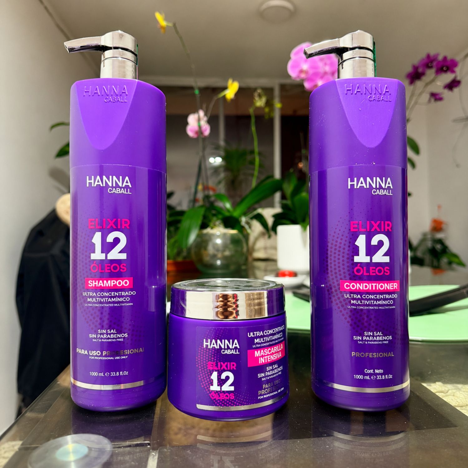 Foto real del pack Hanna Caball Elixir 12 Óleos con shampoo, acondicionador y mascarilla
