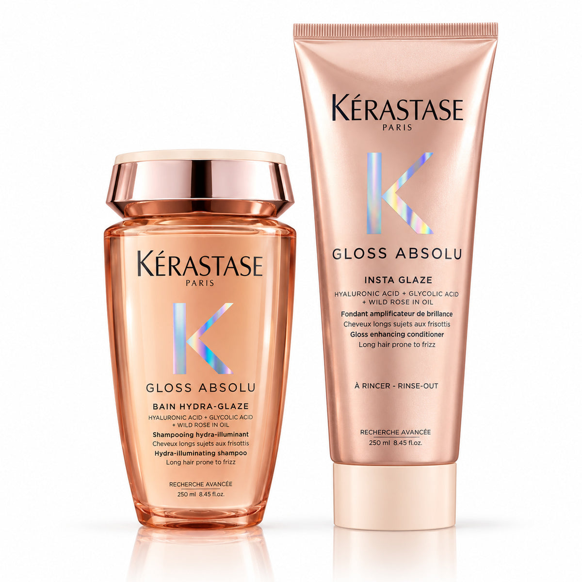 Dúo Kérastase Gloss Absolu sobre fondo blanco: shampoo Bain Hydra-Glaze 250 ml y acondicionador Insta Glaze 250 ml.