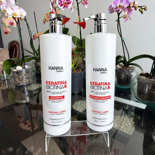 Fotografía real de shampoo y acondicionador Hanna Caball Keratina y Biotina de 1 litro entre orquídeas